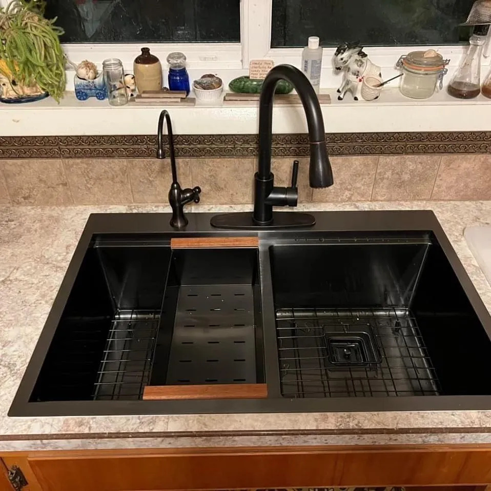 Plumber installing fixtures in Twin Falls home